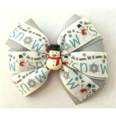 Beautiful Snowman Let it Snow inspired hair bow with resin. 
