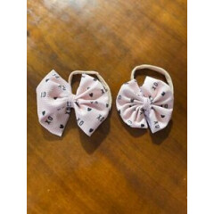 Light pink bullet fabric hair bow on nylon xoxo print
