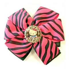 Beautiful Pink and Black Hello Kitty inspired hair bow for girls. 