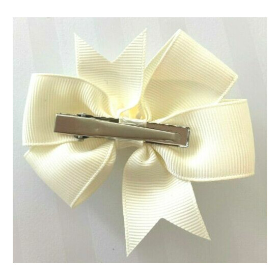 Beautiful Cream Princess Crown inspired hair bow for girls.  image {2}