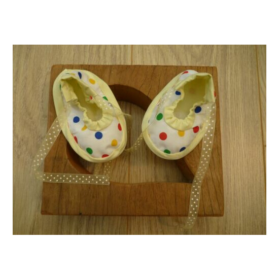 Girl's 6-9 months yellow and spotted handmade material shoes with ribbon ties image {2}