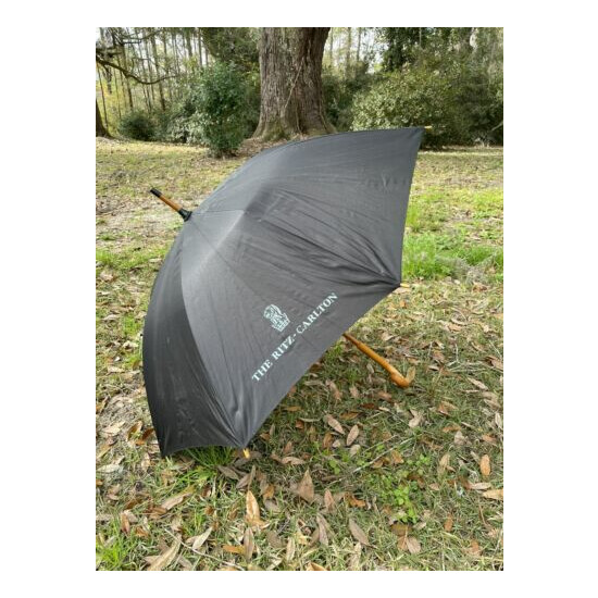The Ritz Carlton Umbrella Black with Curved Wooden Handle image {1}
