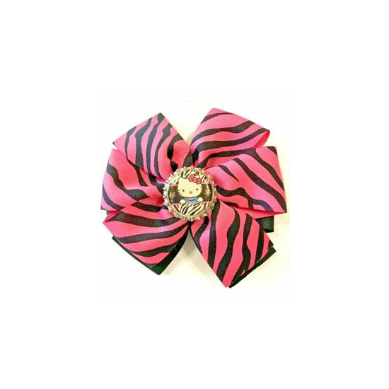 Beautiful Pink and Black Hello Kitty inspired hair bow for girls.  image {1}